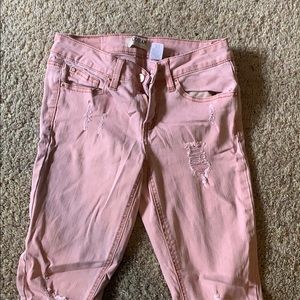 Ripped pink skinny jeans